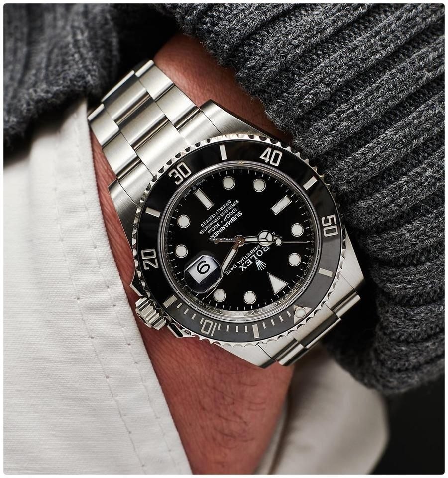 ساعت مچی مردانه Rolex Submariner  برای آقایان    موتور میوتا ژاپن گرید A++ دارای روزشمار قاب دوار شیشه‌ای حک لوگو رولکس در دیواره داخلی ساعت پیچ تنظیم قفلی بند و قفل استیل اصلی رولکس  شیشه تلسکوپی