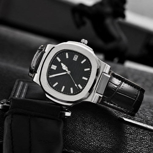 ساعت مچی ☑️PATEK ♤مردونه دارای روزشمار طرح پتک قفل کمربندی موتورکوارتز بندچرمی